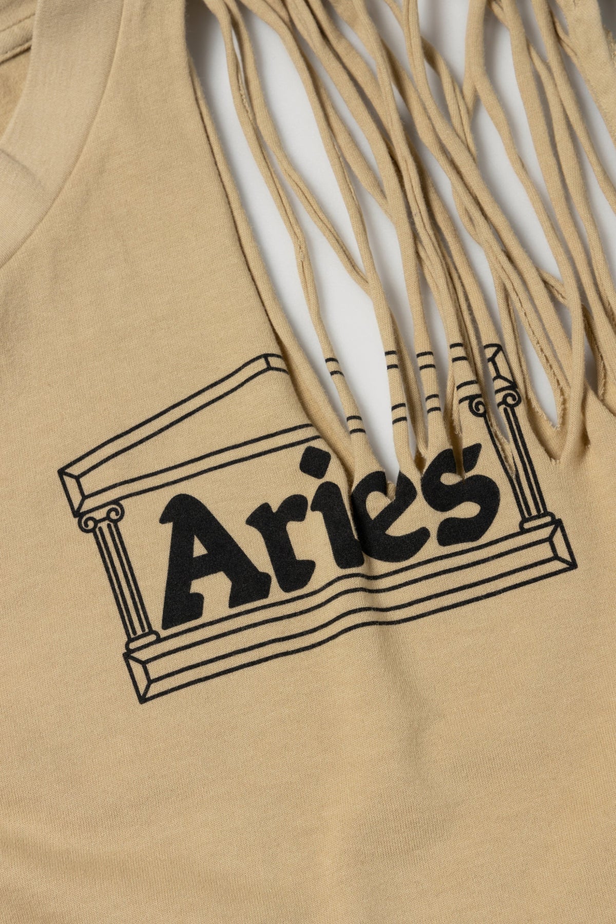 SLASHED SHOULDER TEMPLE VEST / ARIES / PEBBLE